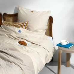 Normann Copenhagen Snooze -Louise Smærup shop normann copenhagen sengesaet normann copenhagen snooze happy hangover coral 861675 scaled